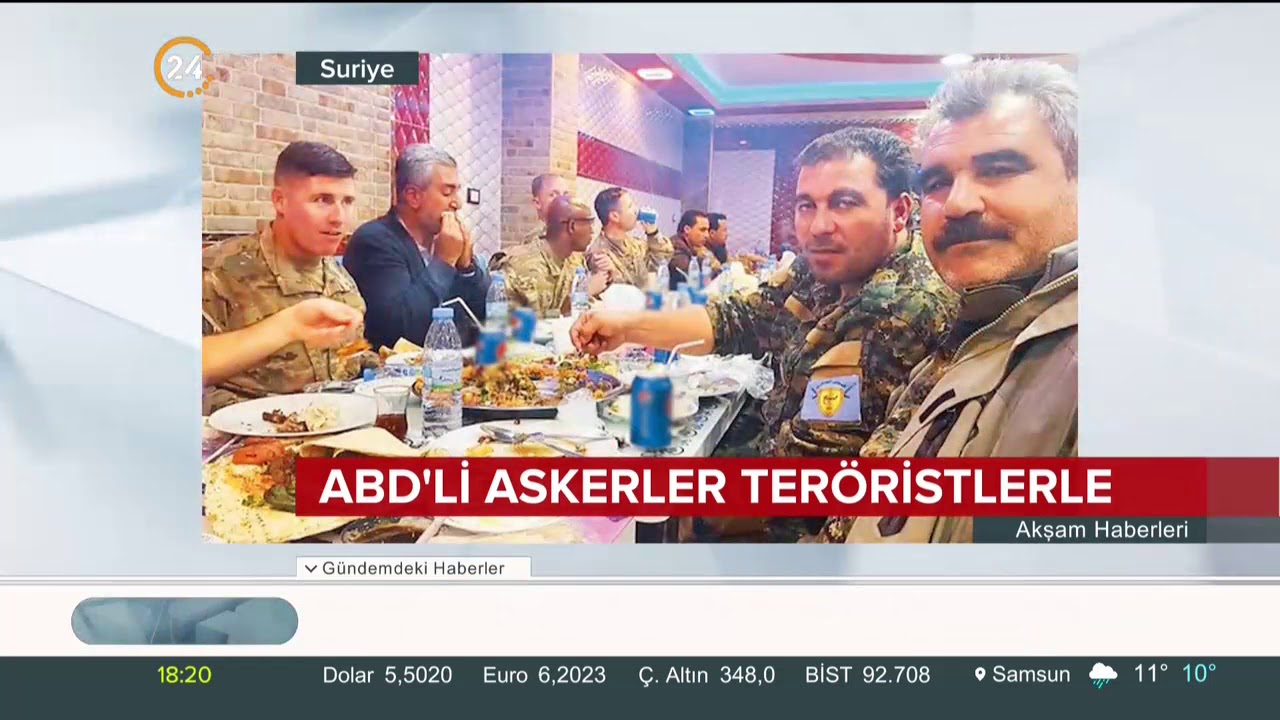 ABD'li askerlerin ter&ouml;ristlerle yemek yediği g&ouml;r&uuml;nt&uuml;ler kamerada