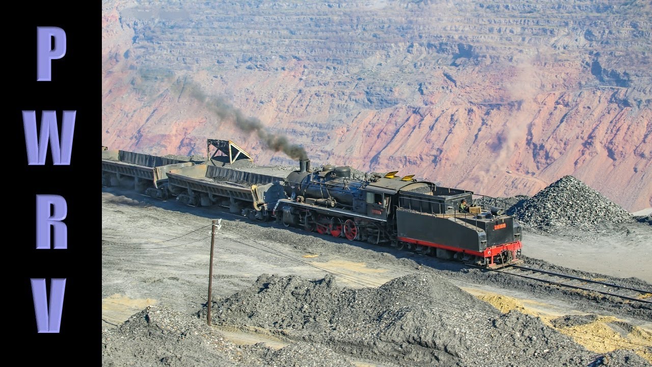 Chinese Railways - Fuxin's 2-8-2 SY Steam Locomotives Work Spoil Trains Into the Huge Old Coal Pit