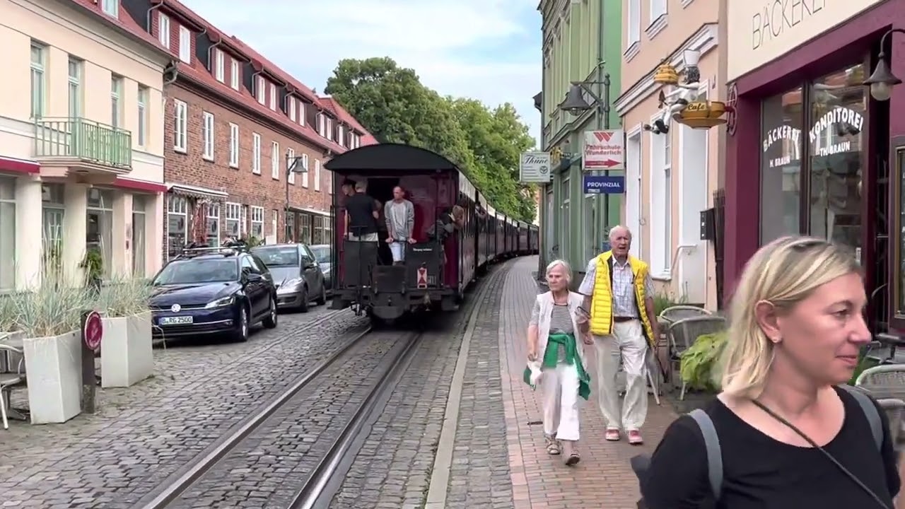 “Molli” narrow gauge 2-8-2T steam locomotive & train in the street @ Bad Doberan, Germany: 8-7-2022