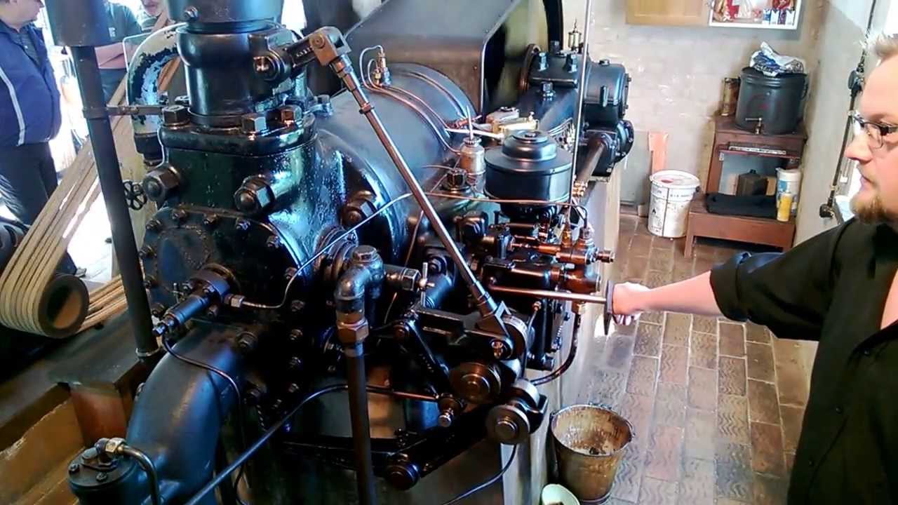 Early 1900's large single cylinder Marshall 42,6l diesel engine run and shutdown