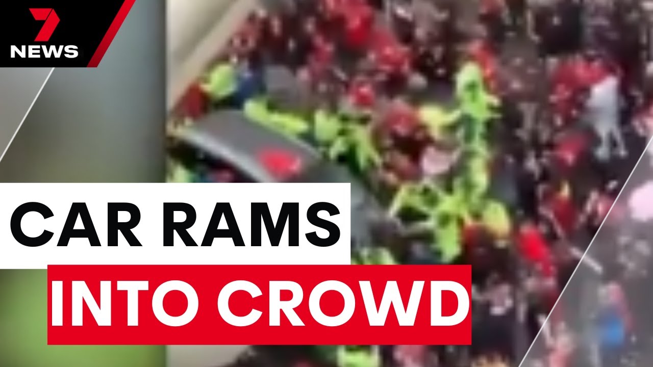 Car ploughs through crowd at Liverpool football parade | 7NEWS