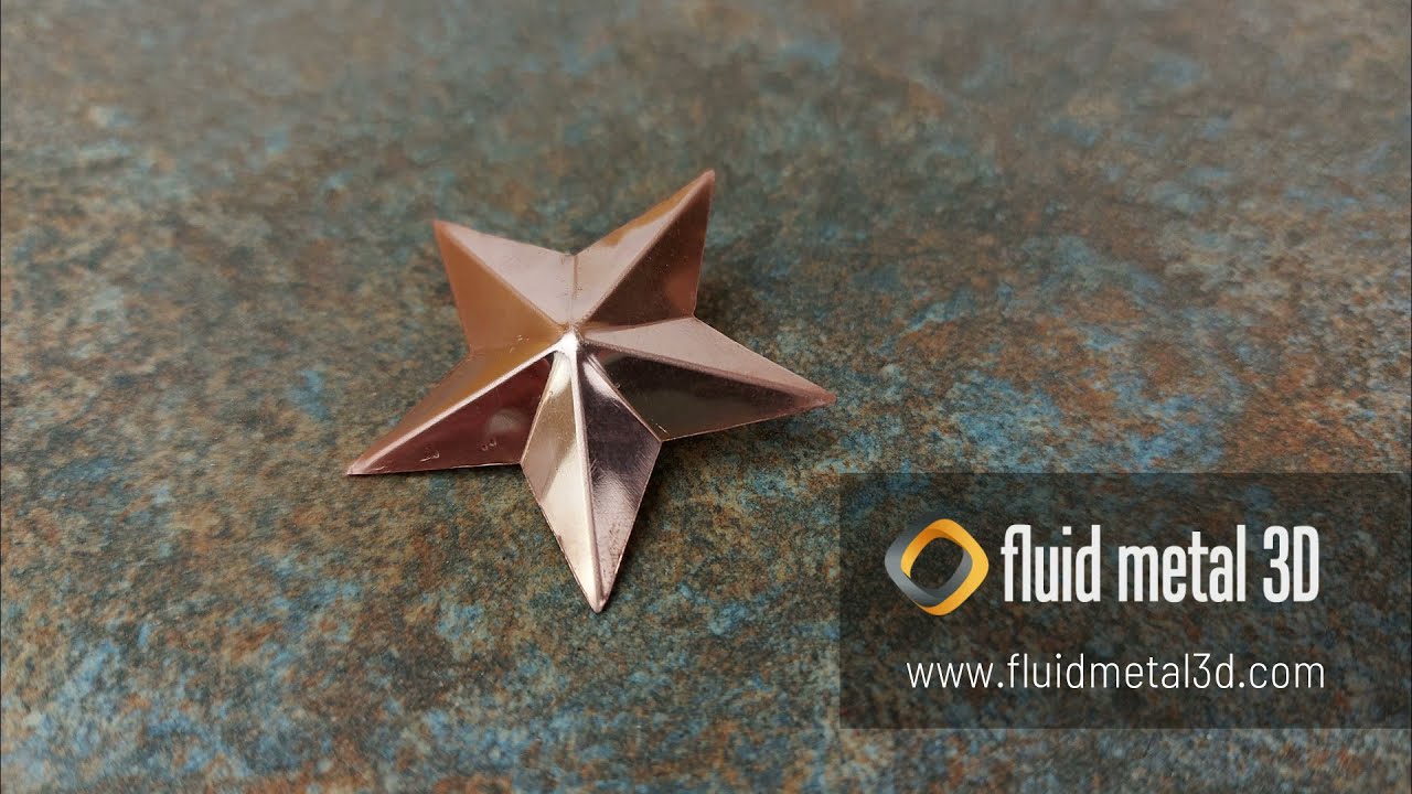 Cutting a copper sheet with a 3D printed and folding into an 'origami' style star