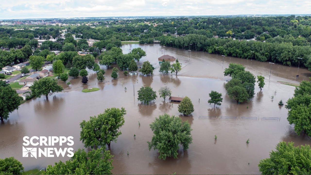 Severe flooding in Upper Midwest prompts evacuations & water rescues