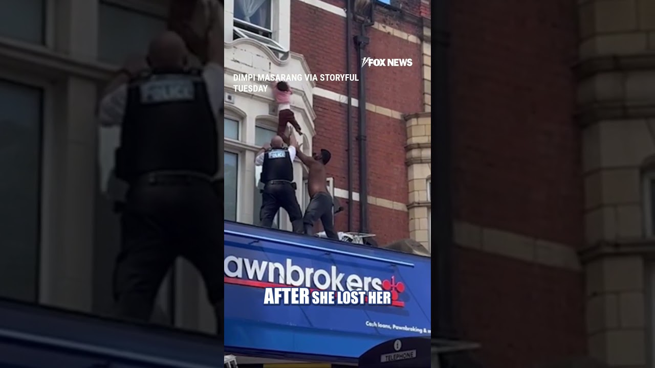 SEE IT: Man makes life-saving catch as London girl dangles from balcony #shorts