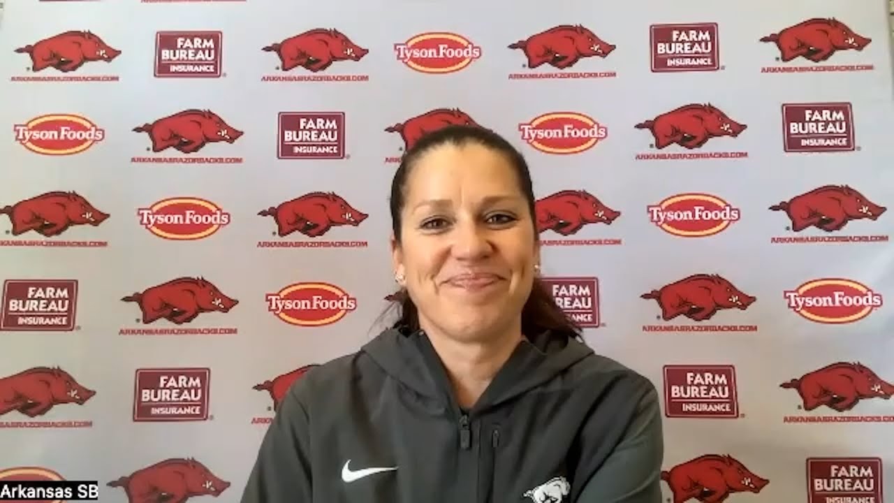 Courtney Deifel and players after Arkansas softball clinches series vs. Georgia