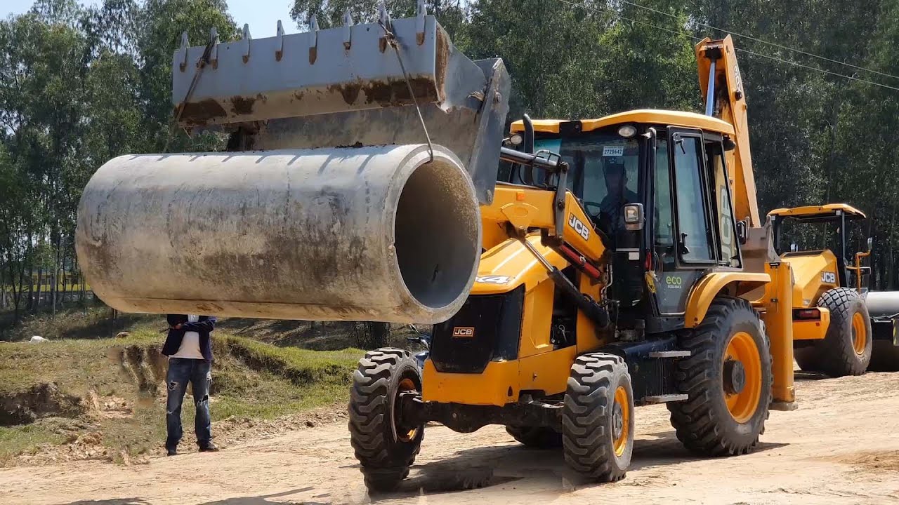 JCB Earth Movers Loading Culvert Pipe and Soil in Tractor - JCB 3dx Backhoe Loader Working Video