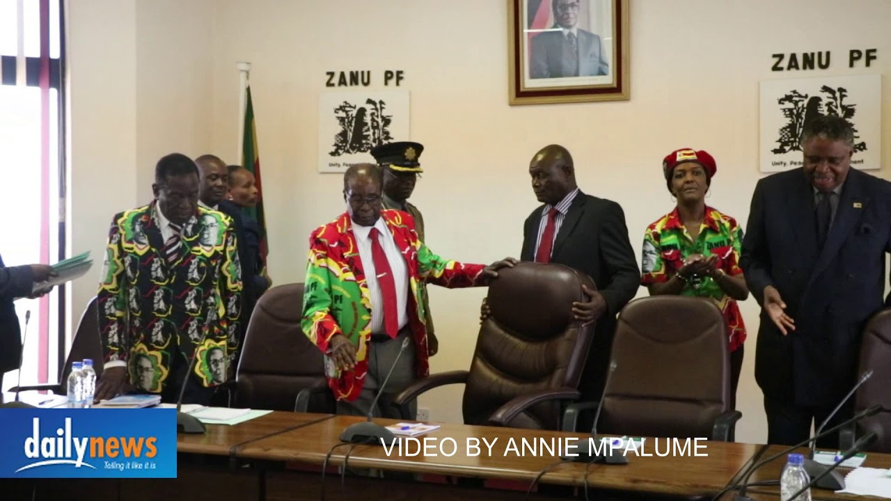 President Mugabe walks into the Zanu PF politburo meeting