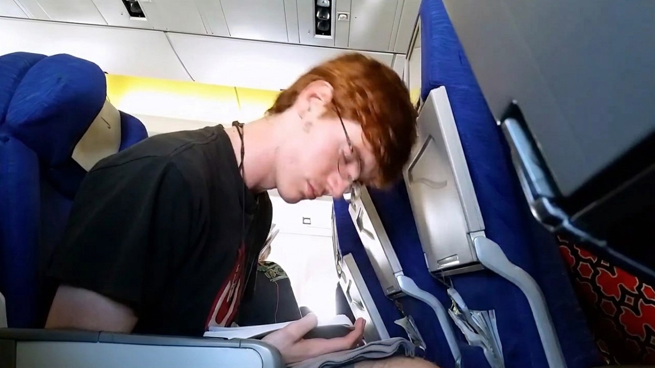 Head Banging While Sleeping On A Plane