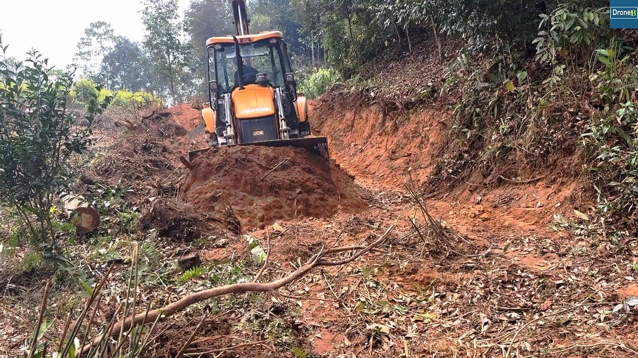 Rocky Mountain Road Construction Site-Connecting Rural Mountain Villages-Leveling and Cutting JCB