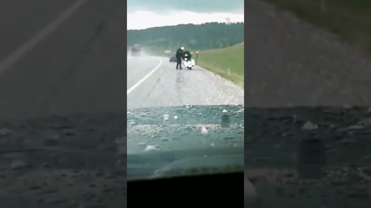 Biker Gets Caught In Heavy Hailstorm 😳🧊