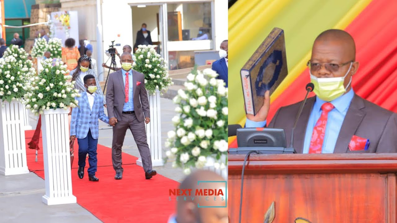 MOSES MAGOGO SWEARS IN AS A MEMEBR OF PARLIAMENT, HE IS AACOMPANIED BY SON AND DAUGHTER
