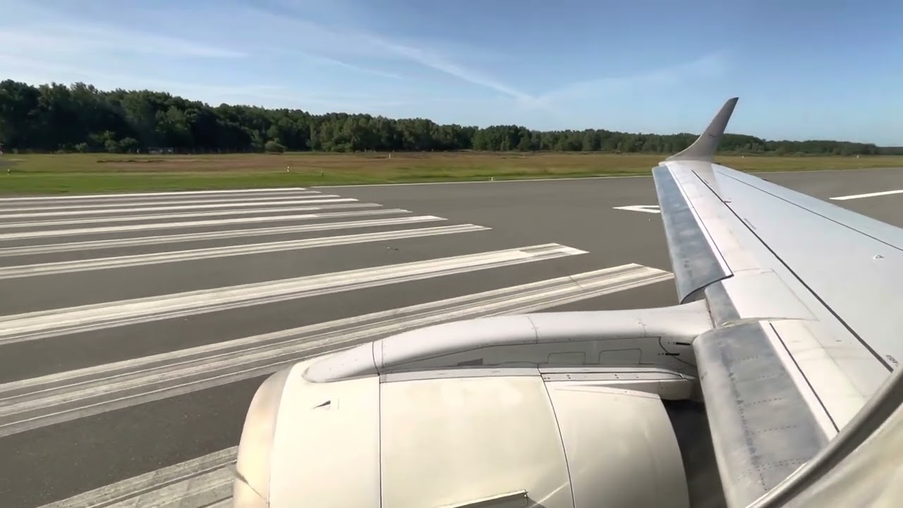 Lübeck Air ( German Airways ) Embraer 190 D-AJHW take off Lübeck Airport EDHL to Bern LSZB Runway 25