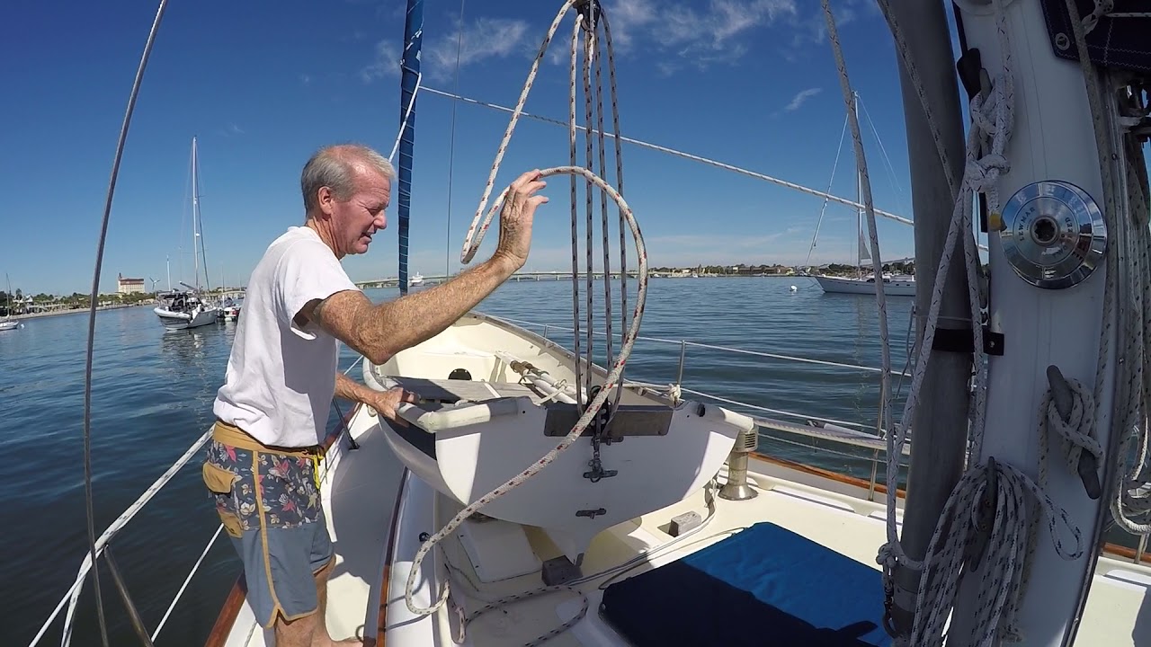 Launching a hard dinghy off our foredeck