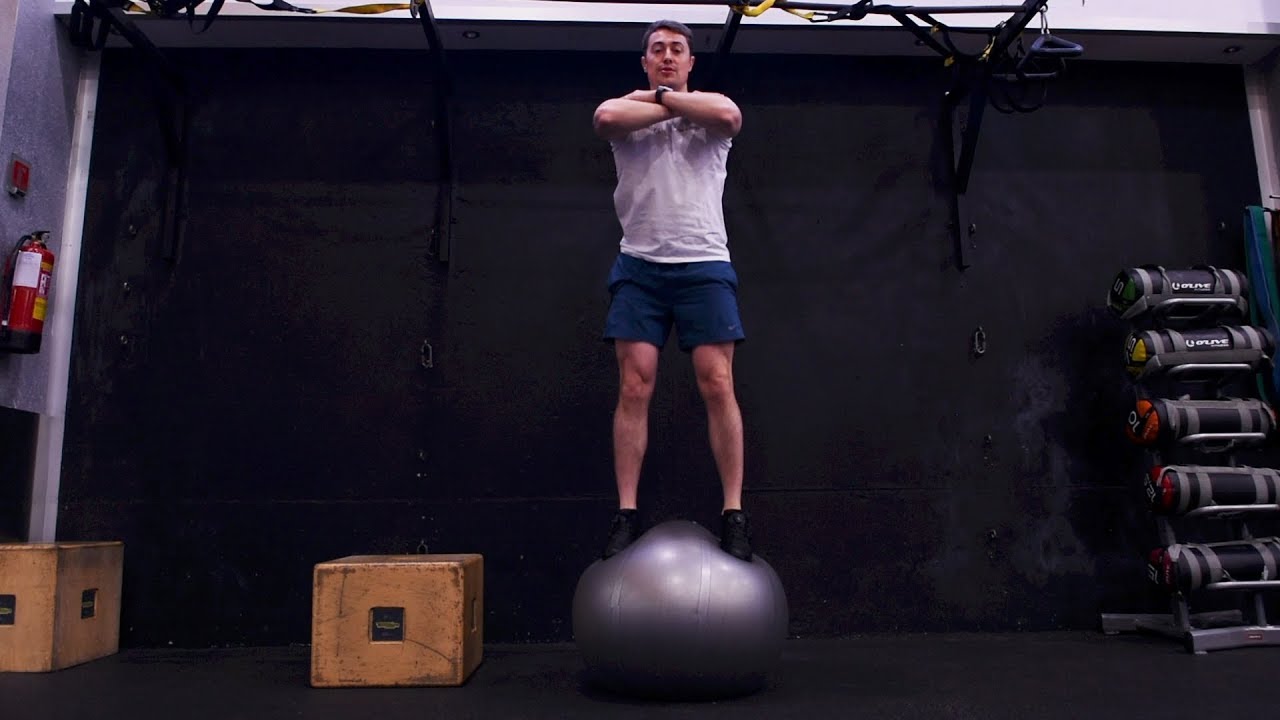 Tutorial: Learn to squat on an exercise ball or fitball