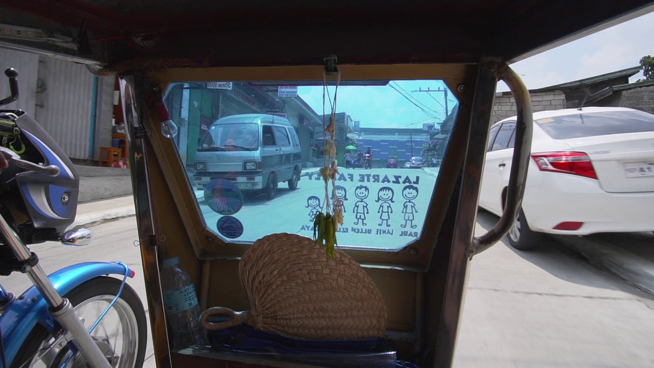 Philippines, tricycle ride from Dela Costa Homes III to SM City San Jose Del Monte