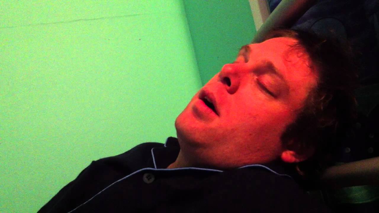 Man fighting sleep