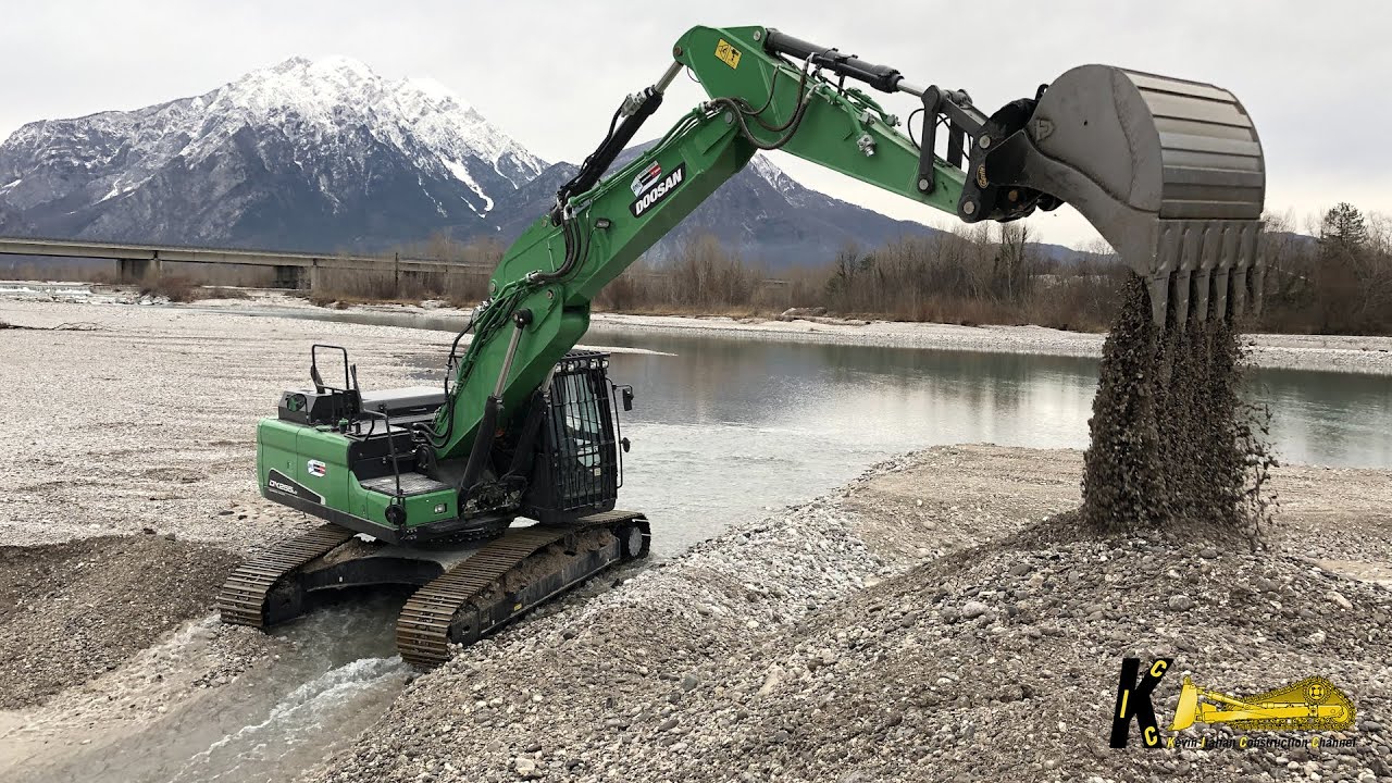 DOOSAN DX255 Excavator Digging Gravel Under Water