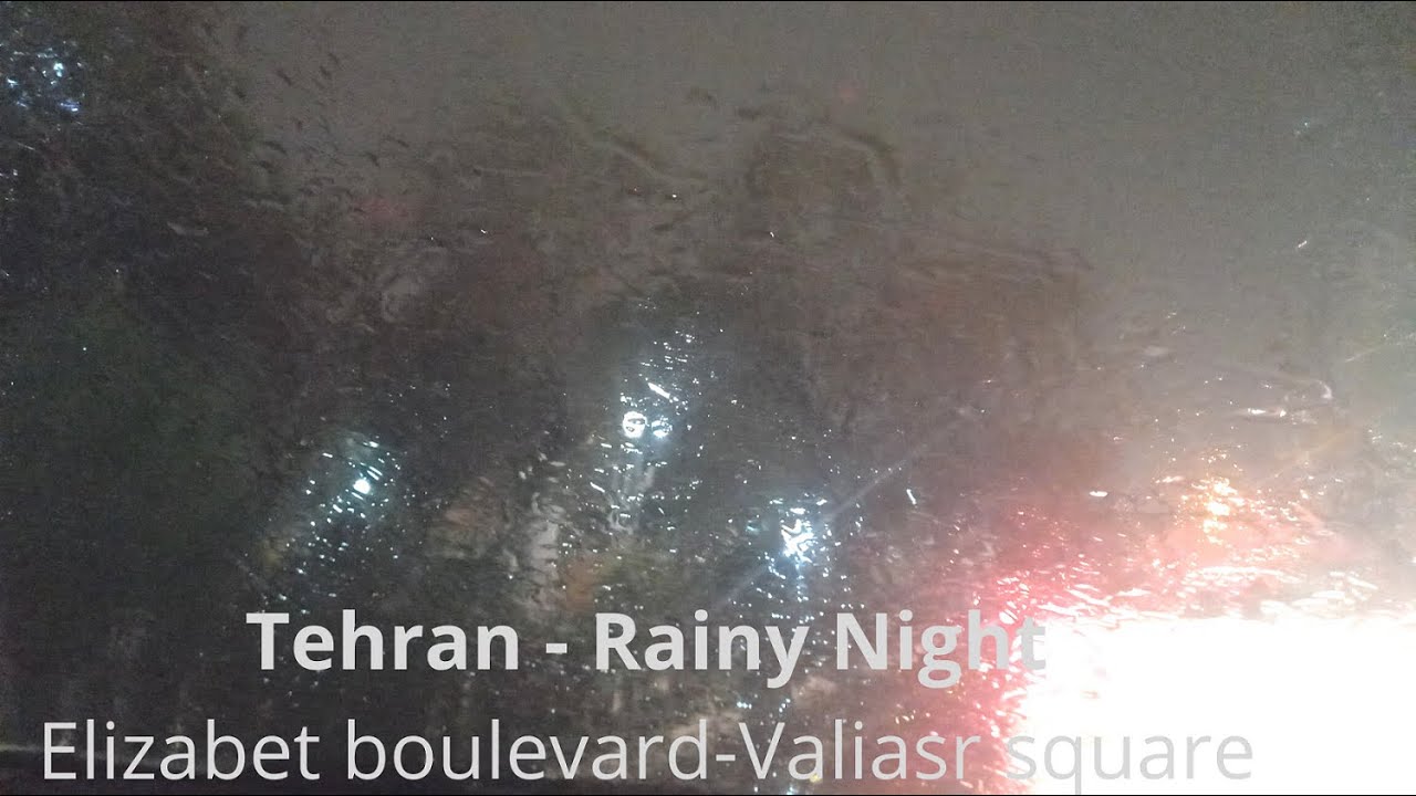 Rainy night driving in winter in Keshavarz(Elizabet Blvd) in Tehran 1400