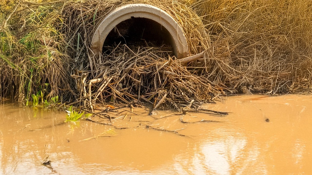 Clearing a Rural Outflow Filled with Mud & Plastic Waste