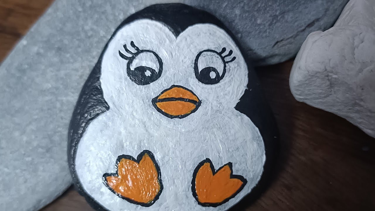Stone art.. penguin painting on stone.. acrylic on stone..