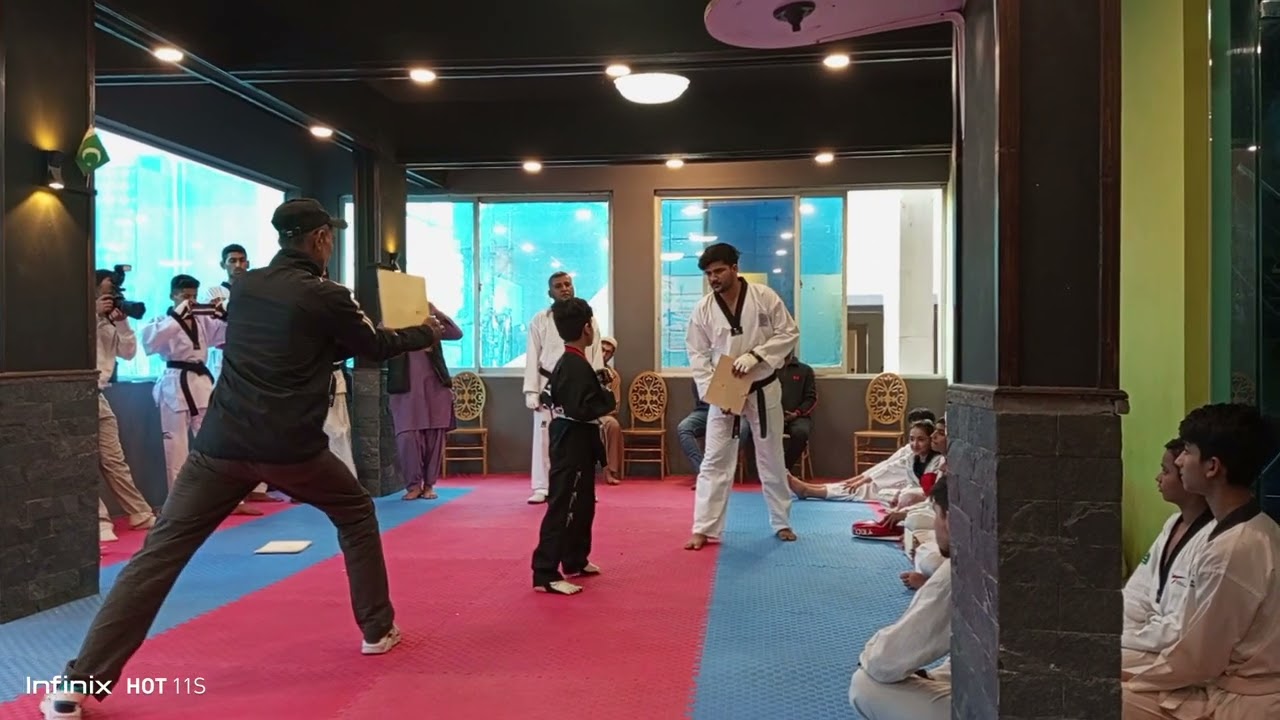 Karachi Taekwondo Academy's belt promotion ceremony breaking test