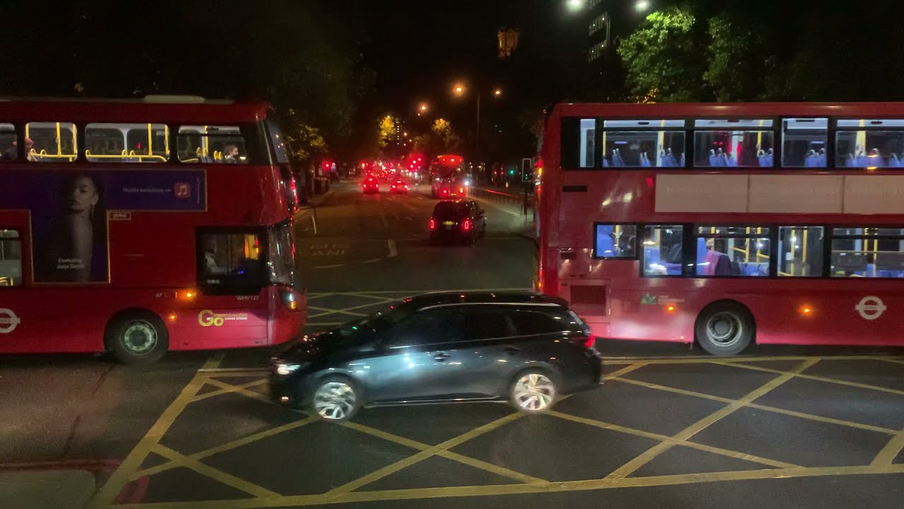 Bus ride night time from Kings Cross to Paddington station in London