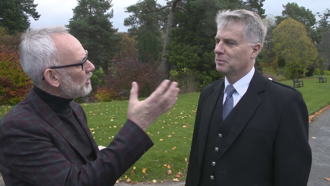 Jack Lee talks to Fergus Muirhead outside Blair Castle at the Glenfiddich Piping Championship 2017