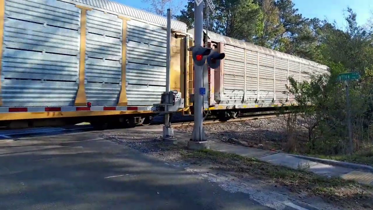 CSX 3149 mixed freight train passes Westbound of Chaffee Road in Jacksonville Florida 