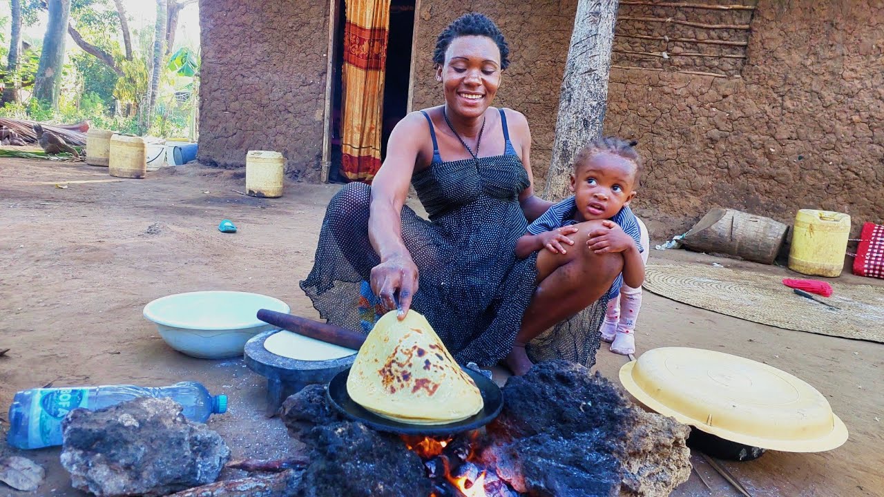 Our Young African Single Mother #cooking Turmeric Bread Served With Organic Beans For Dinner