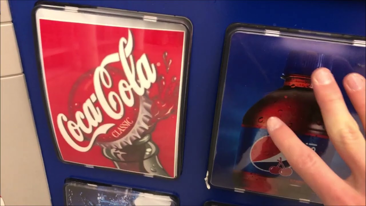 Buying a Milky Way and Pepsi Wild Cherry from the Vending Machines at the Troy Transit Center