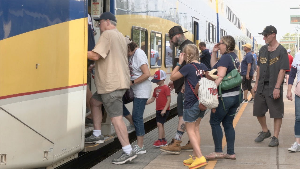 All aboard! Twins fans hop on the Northstar playoff express to Target Field