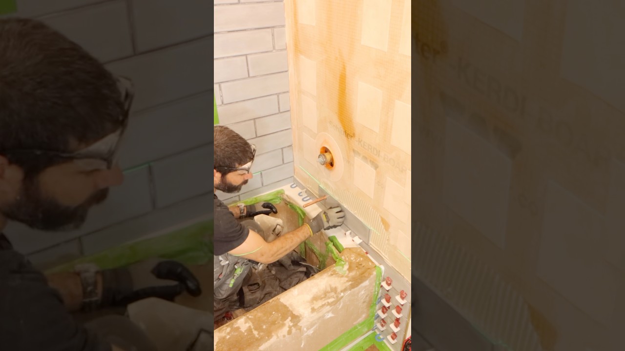 How to Tile Around Copper Tub Spout - #shorts #homerepairtutor