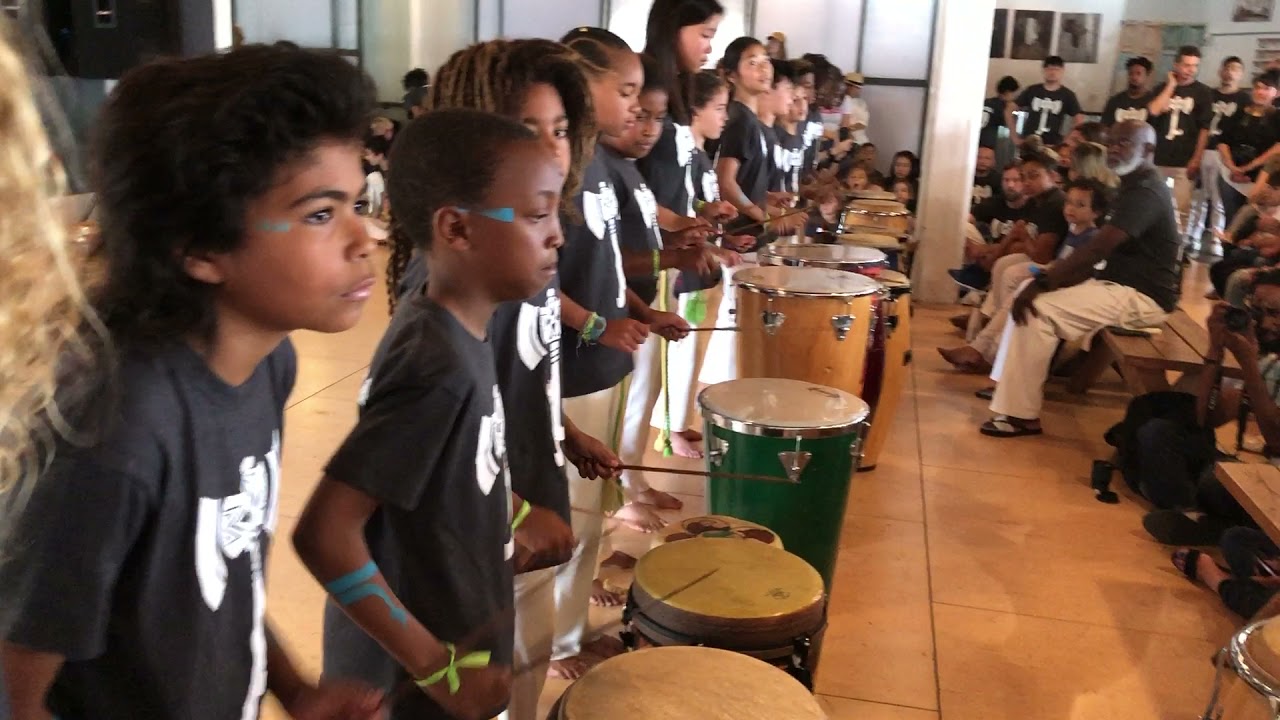 Capoeira Batuque Kids drumming as part of their performance for their yearly graduation at BBCC