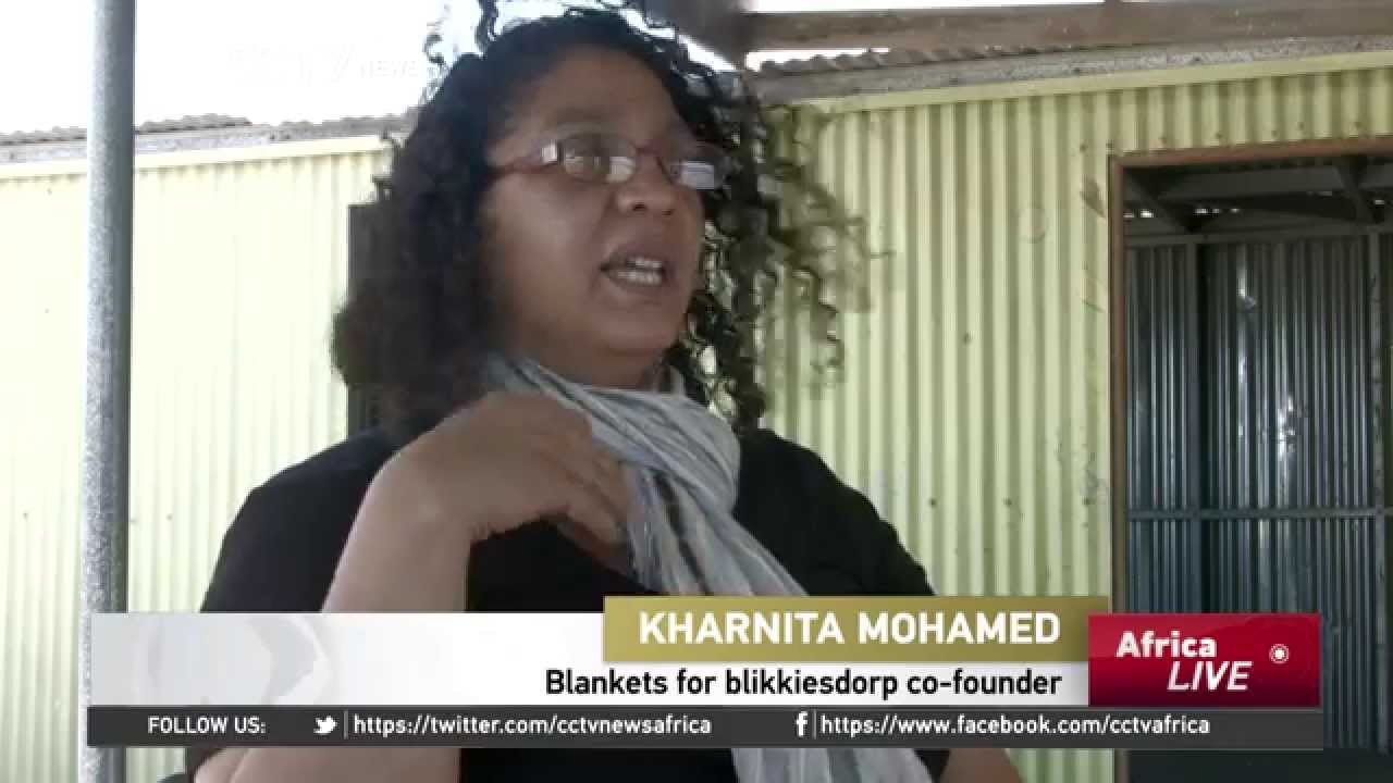 Group of women in Cape town weave blankets for the needy