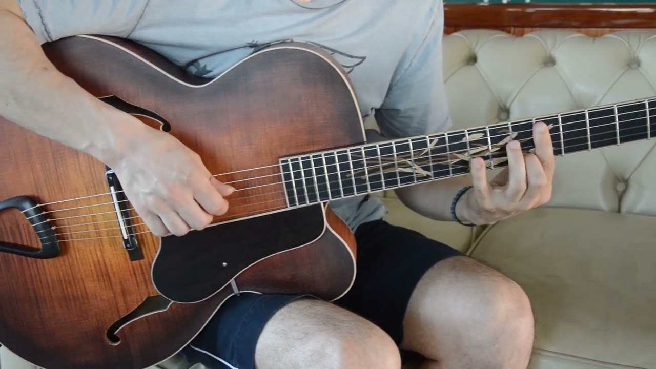 Shank Instruments Milano. Nylon strings acoustic archtop guitar. Flamed maple