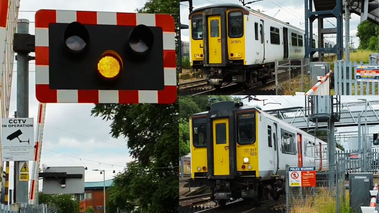 Trains at Cheshunt Level Crossing, Hertfordshire