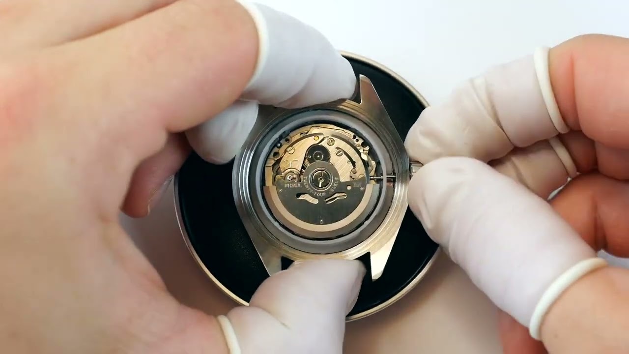 6) Inserting movement and sealing the case (Explorer)