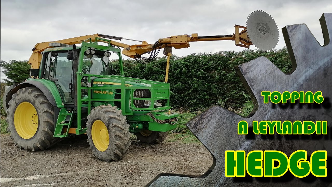 HYDROCUT G-RAHF (GIRAFFE) WITH LONG REACH SAW   TOPPING A LEYLANDII HEDGE  pt 1