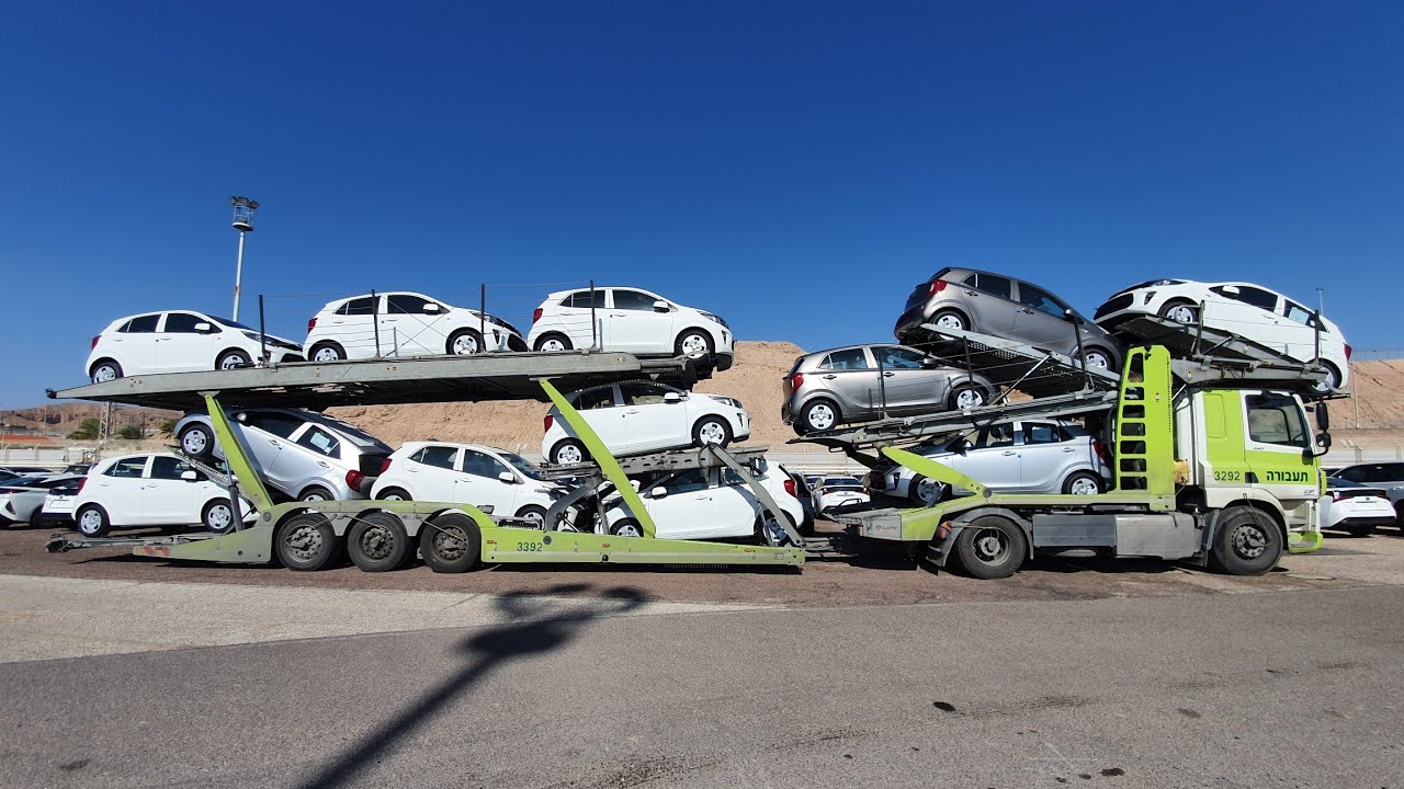 Loading 12 car transporter LOHR
