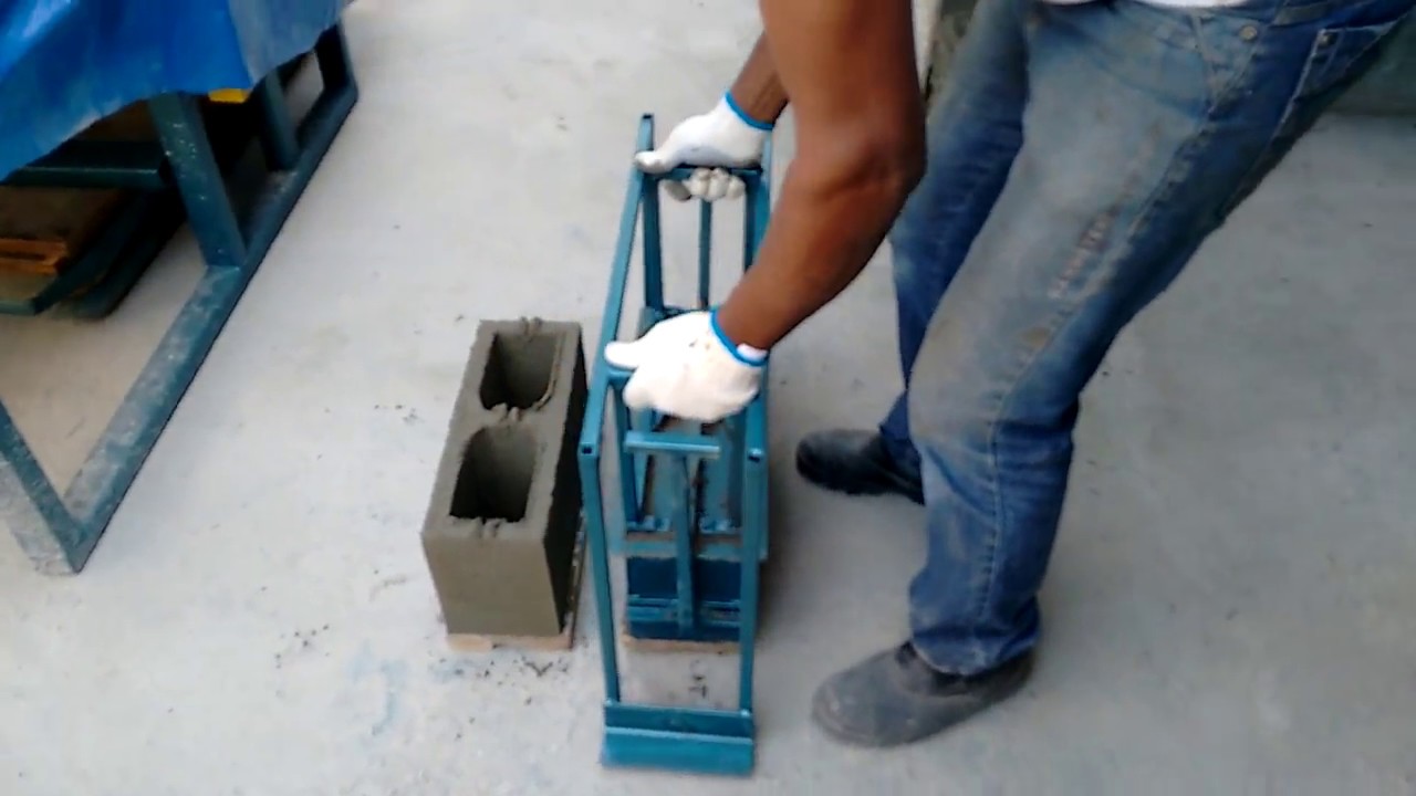 mesa vibratoria para fabricar blocos de concreto com forma manual simples, ergonomica