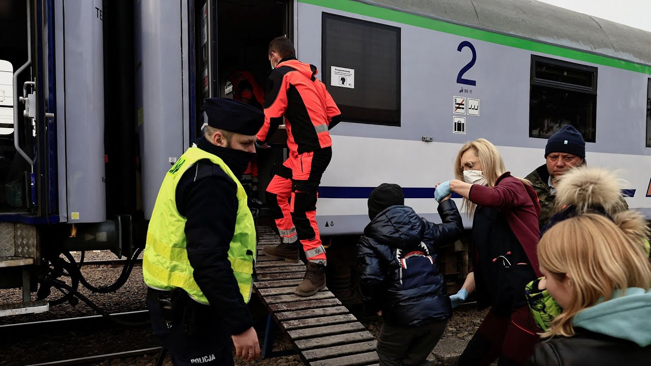 Live: Ukrainians flee across the border into Poland