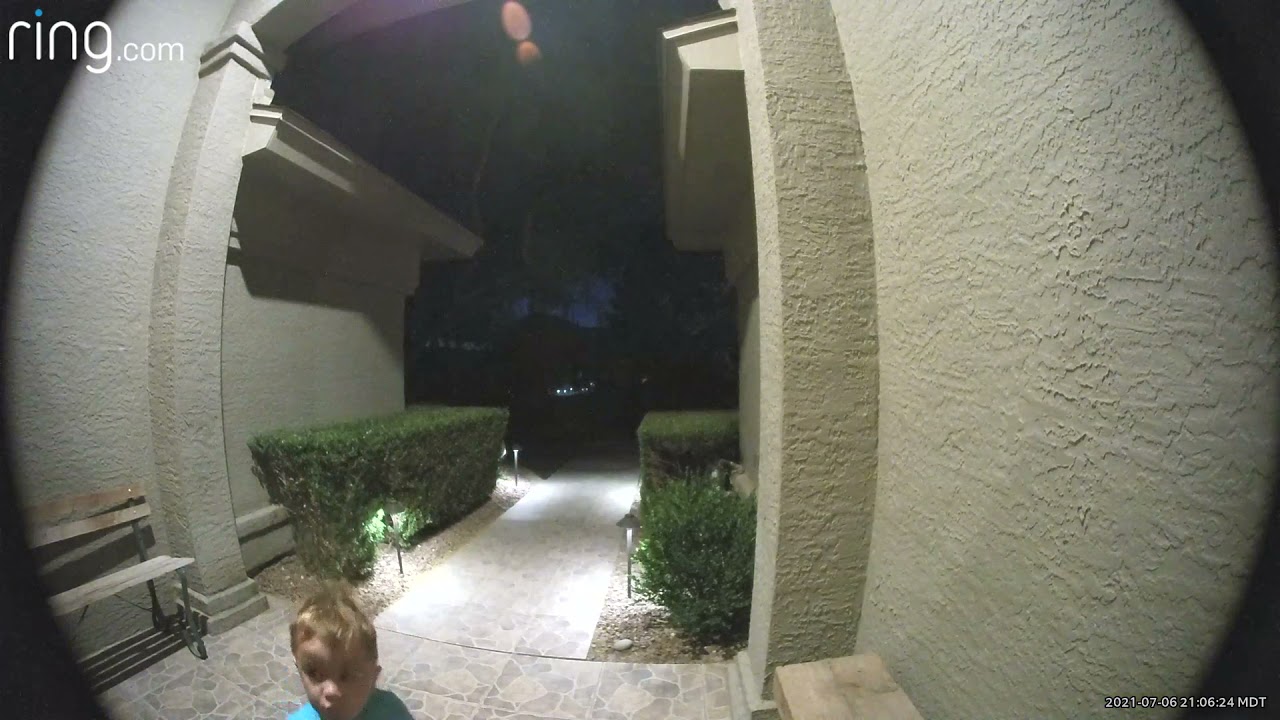 Jax pooping on the front porch, 3 years old.
