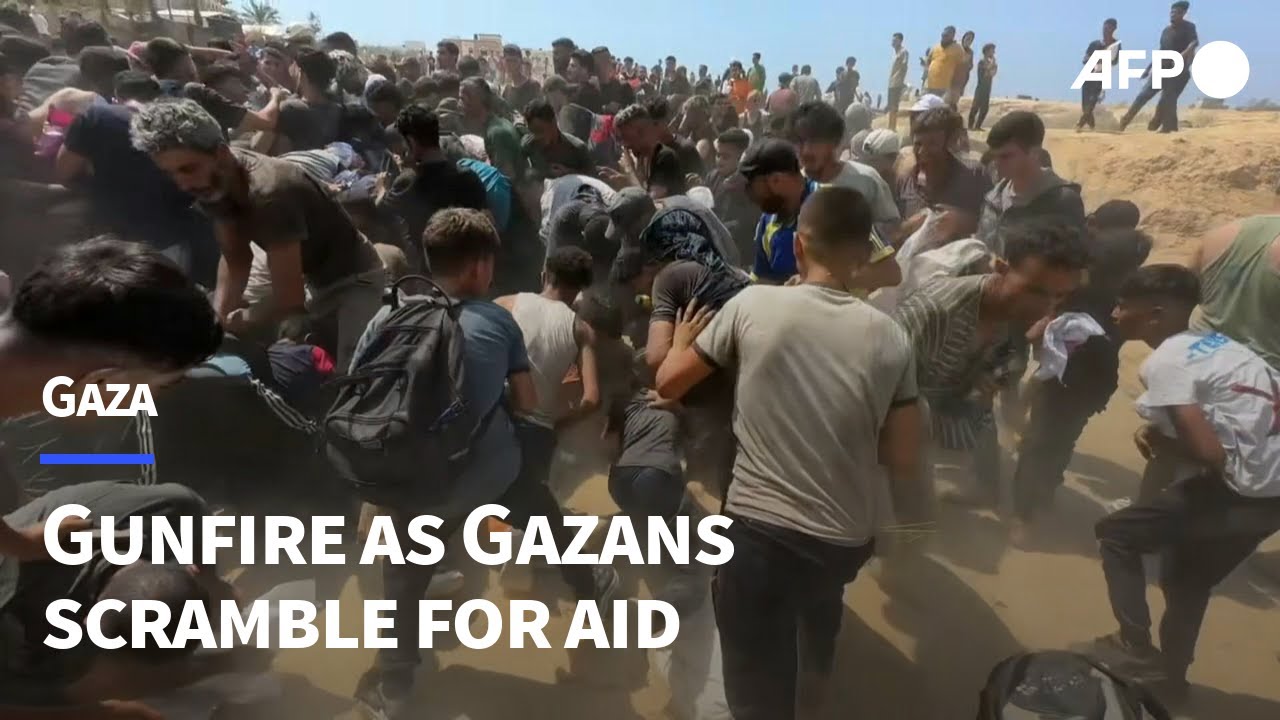 Gunfire amid chaotic scenes as Gazans scramble for desperately-needed aid in Al-Zawayda | AFP