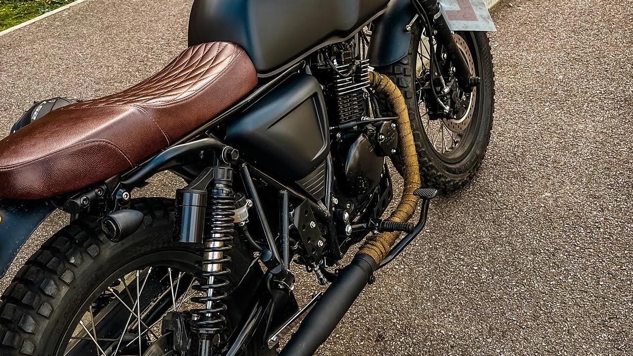 Mutt motorcycle exhaust change and heat wrap added.
