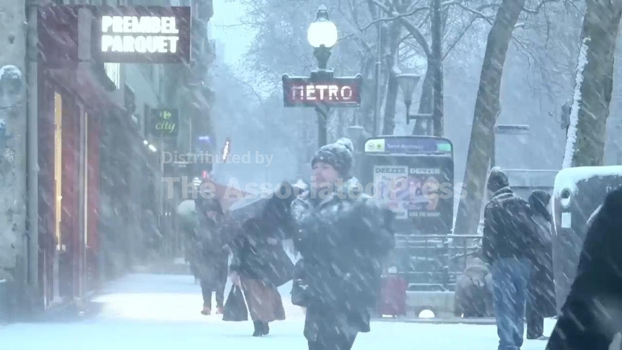 Paris under blanket of snow as temperatures drop below zero