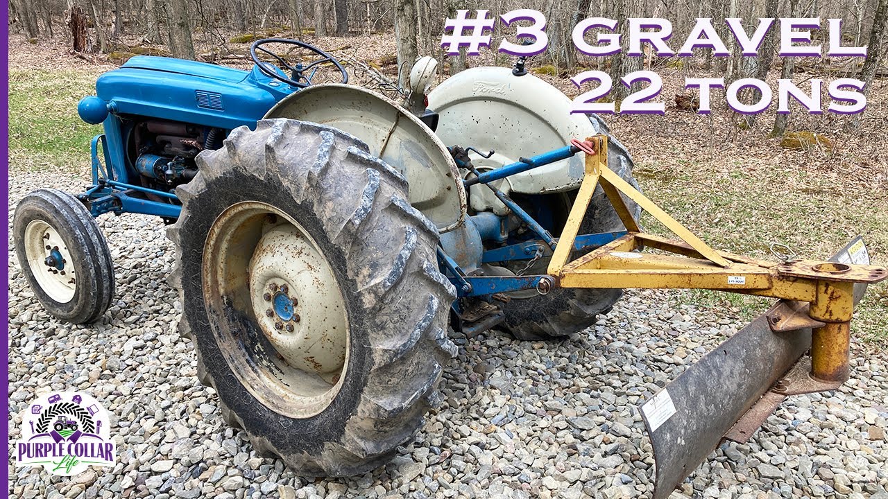 Antique Ford tractor spreading 22 tons of #3 gravel in driveway