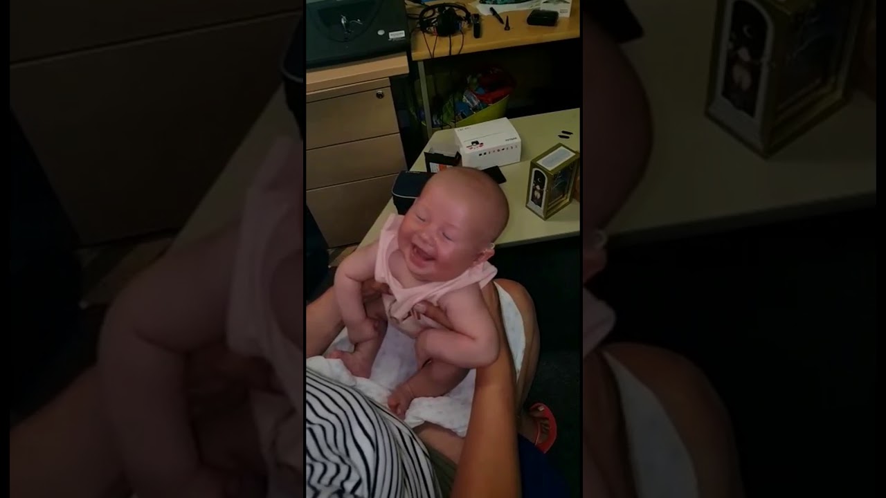 Deaf baby hears for the first time with hearing aids