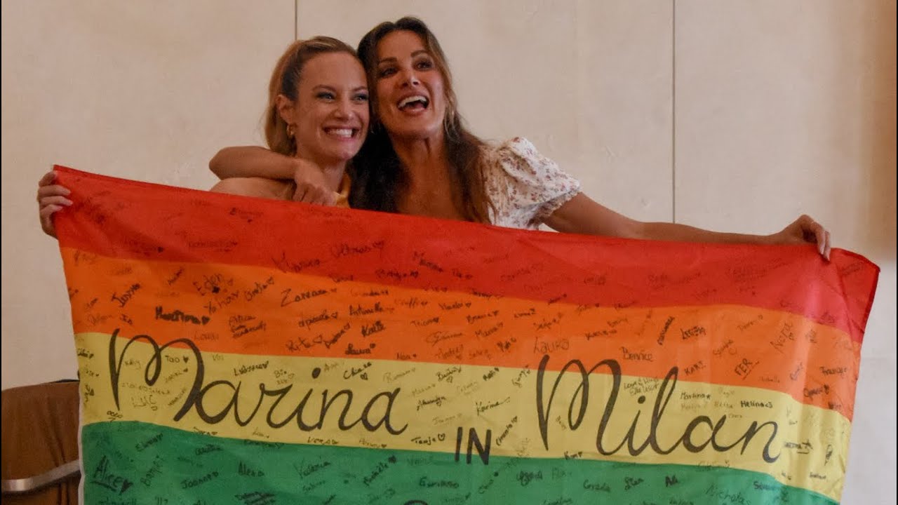 Danielle & Stefania receiving the pride flag signed by fans | Day 2 Milan, Italy May 2023