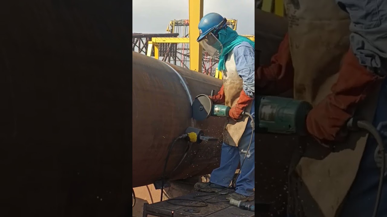 Indian grinder hard working in construction