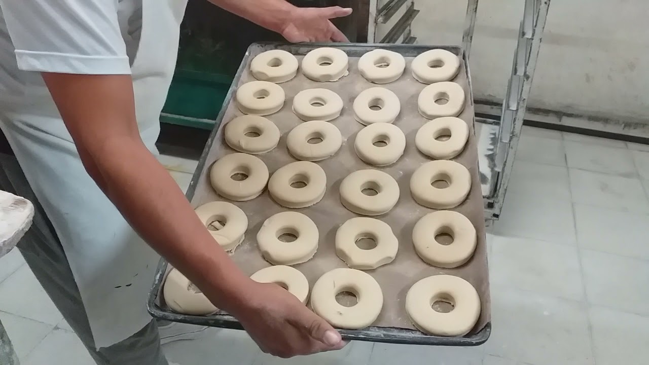 preparar unas ricas y deliciosas donas sabor vainilla espolvoreadas con az&uacute;car